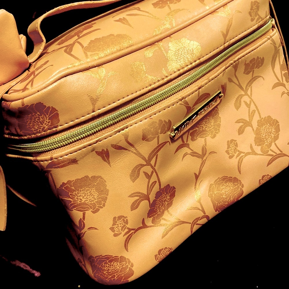 Betsy Johnson & YSL makeup bag